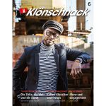 E-Paper Ausgabe 06-25 - auf dem Cover ist Yared Dibaba zu sehen. Er trägt eine norddeutsche Kluft mit Schiebermütze. und Ringelshirt.